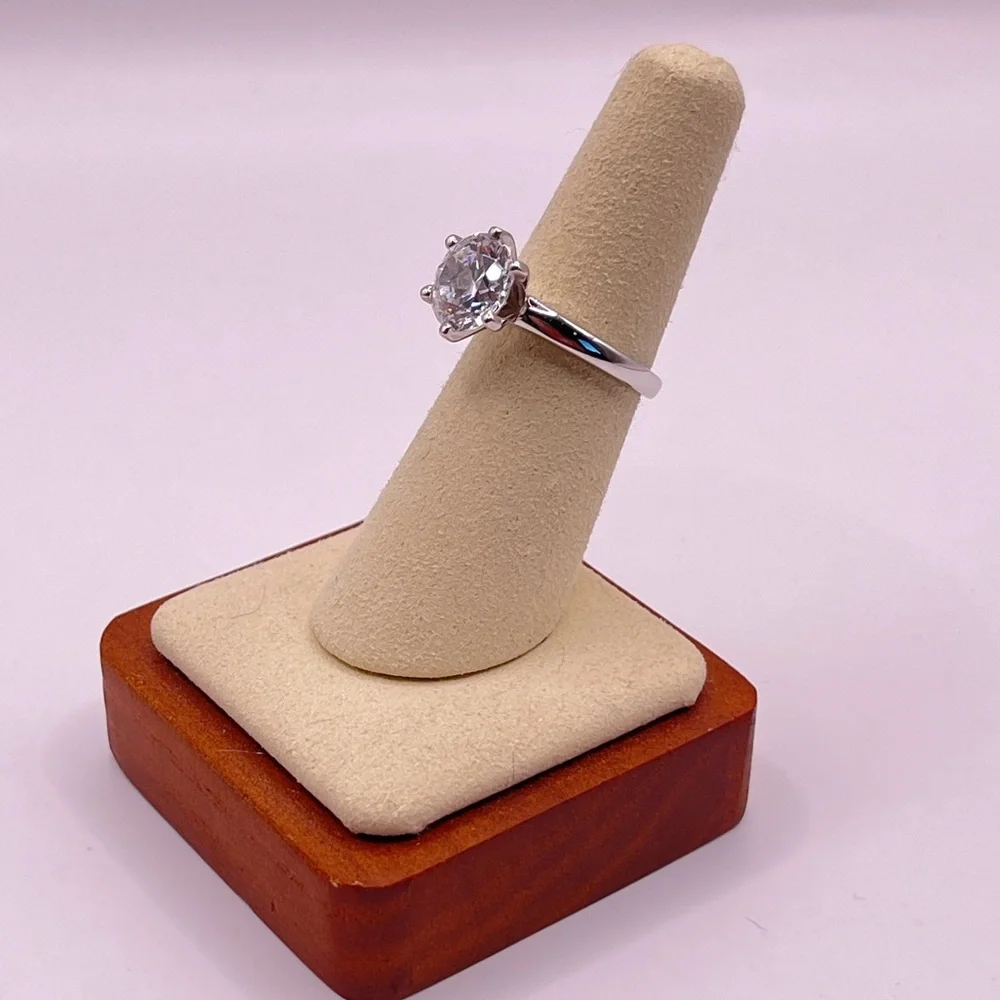Two (2) carat cz solitaire in a 925 sterling silver setting. Size 6.25.